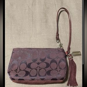 Coach signature wristlet maroon